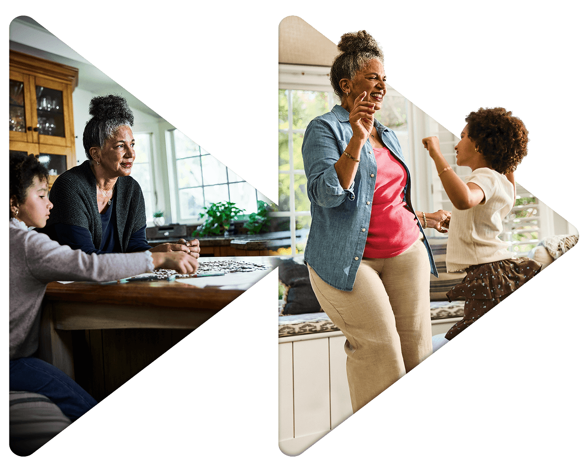 Grandmother and granddaughter dancing together